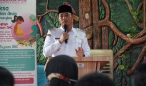Wakil Bupati Kapuas Hulu, Wahyudi Hidayat memberikan paparan dalam acara Jambore Kader Posyandu Perbatasan Malaysia - Indonesia (Malindo) di wilayah Kecamatan Badau, Rabu (07/09/2022). (Foto: Ishaq/KalbarOnline.com)