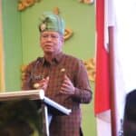 Pj Gubernur Kalbar, Harisson memberikan sambutan sekaligus membuka Raker Komwil V Apeksi Regional Kalimantan Tahun 2023, di Hotel Mercure, Kamis (07/12/2023). (Foto: Jauhari)